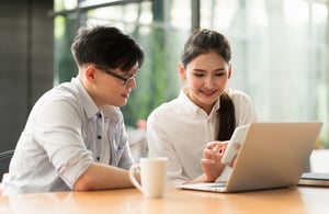 Car shoppers looking at online videos and resources