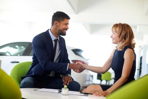 Salesman adapting sales strategies to match the future of car dealerships